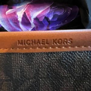 Dark brown Michael Kors wristlet